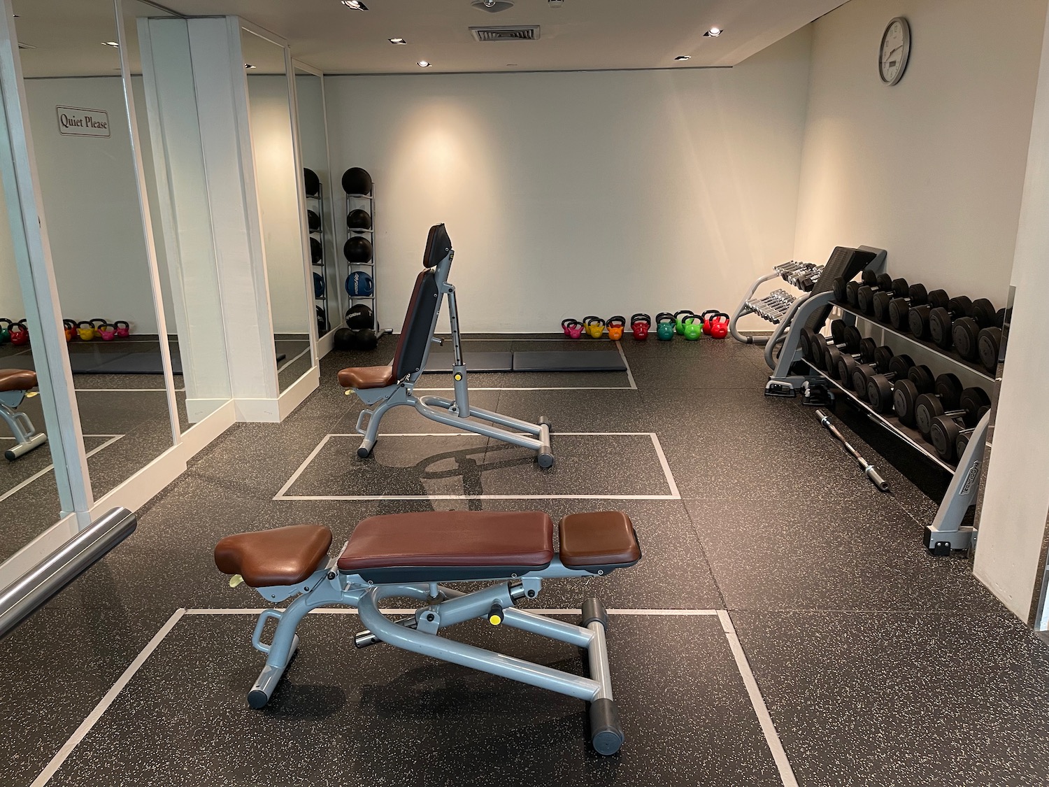 a gym with weights and exercise equipment