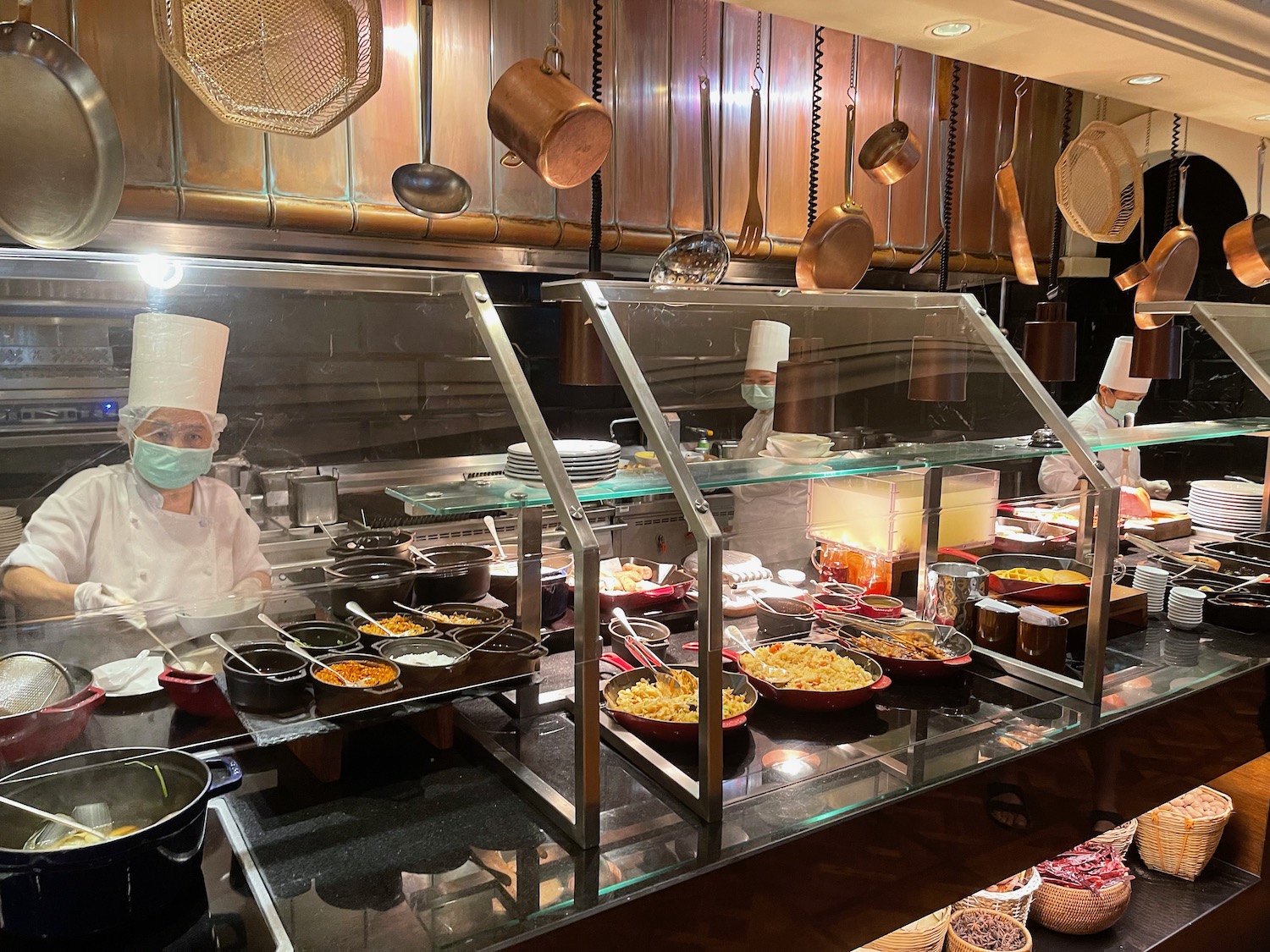 a group of people in a kitchen