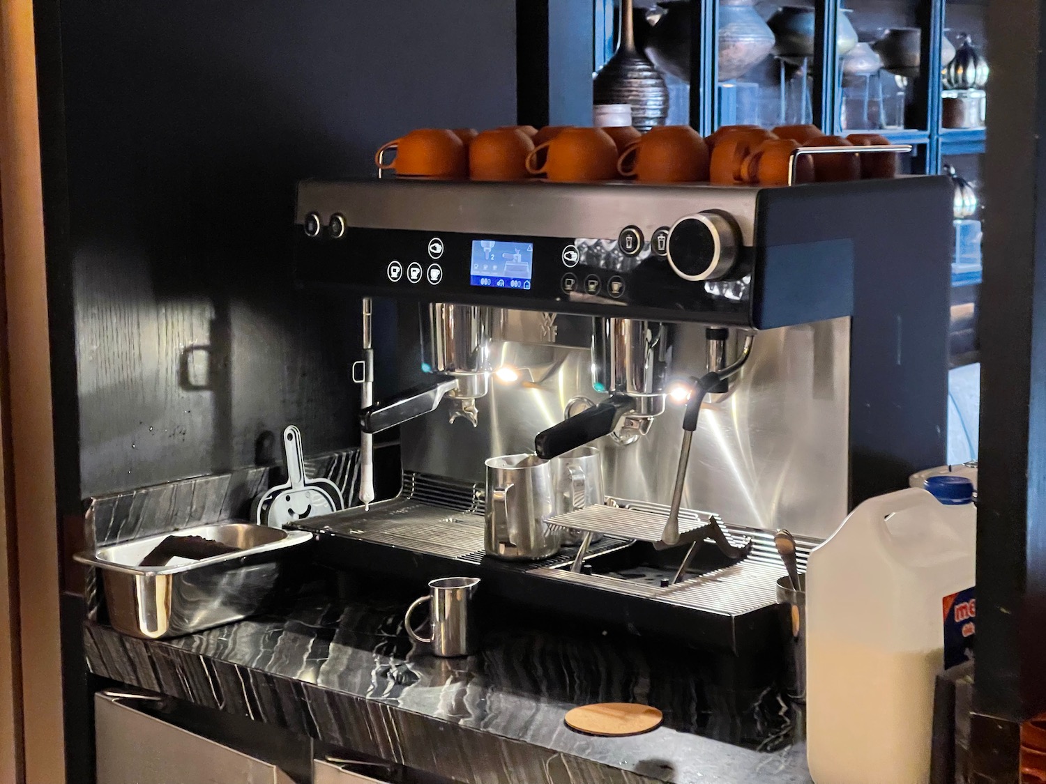 a coffee machine with pots on top