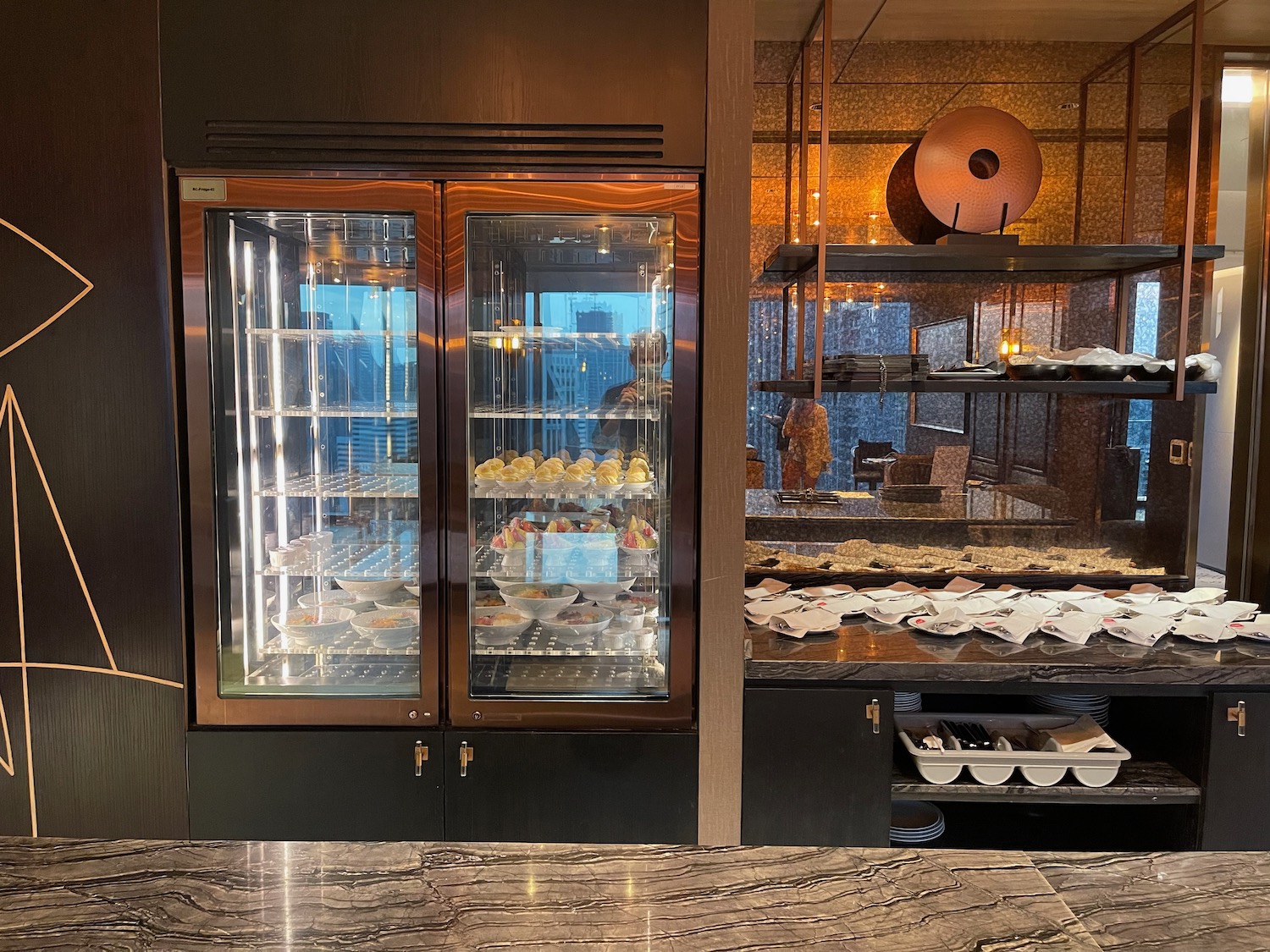 a display case with food on shelves