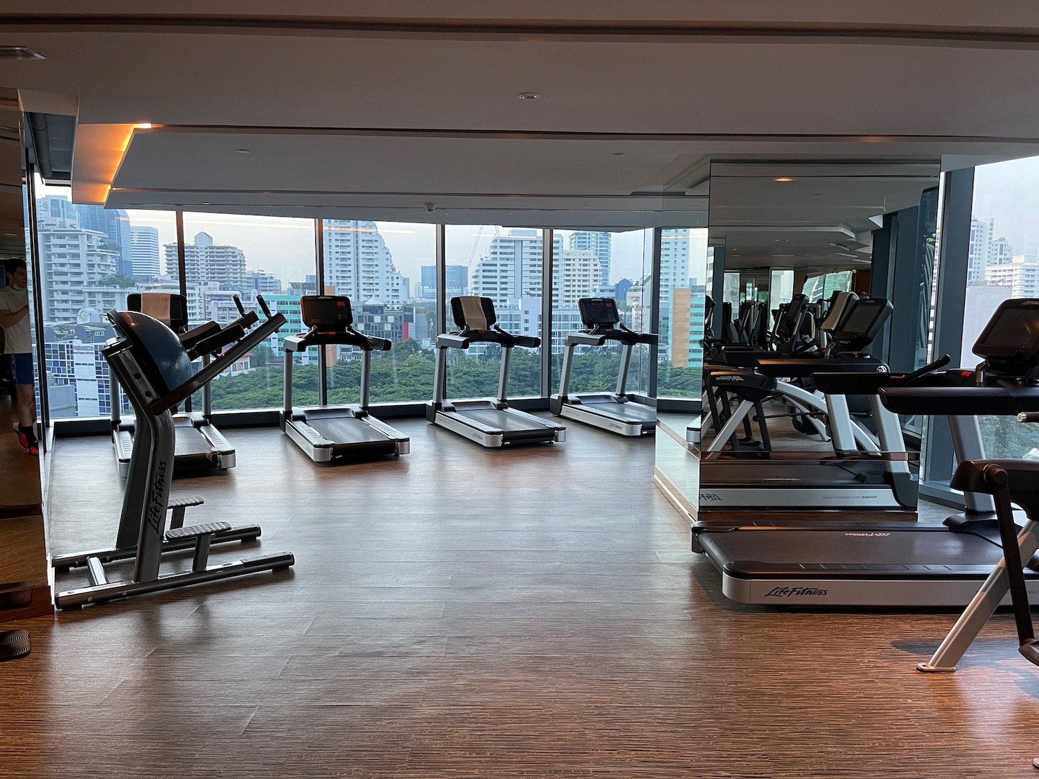 a room with treadmills and exercise equipment