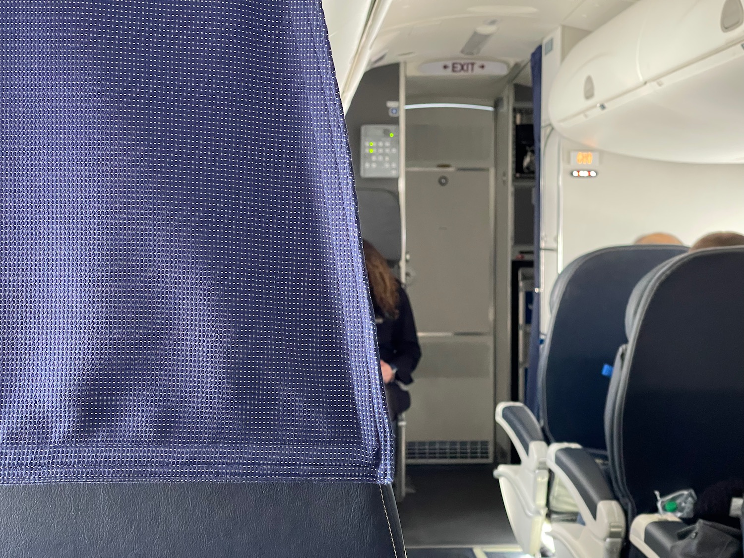a person standing in an airplane
