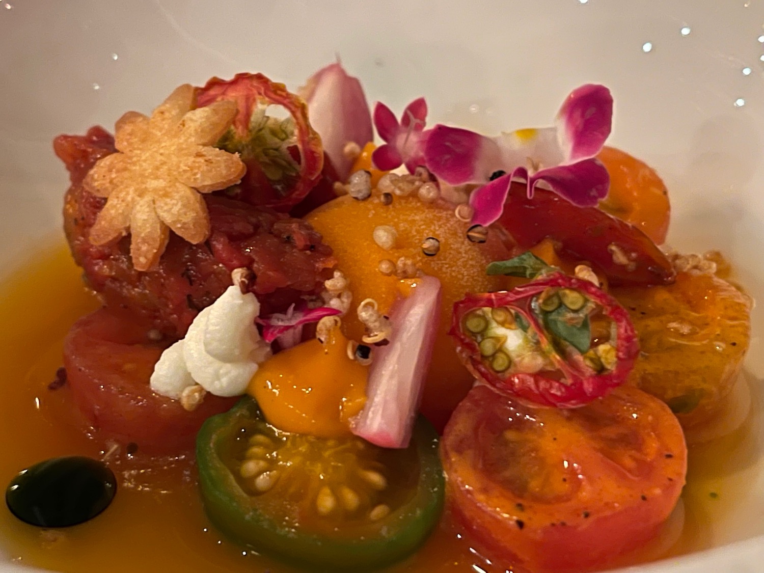 a bowl of food with flowers