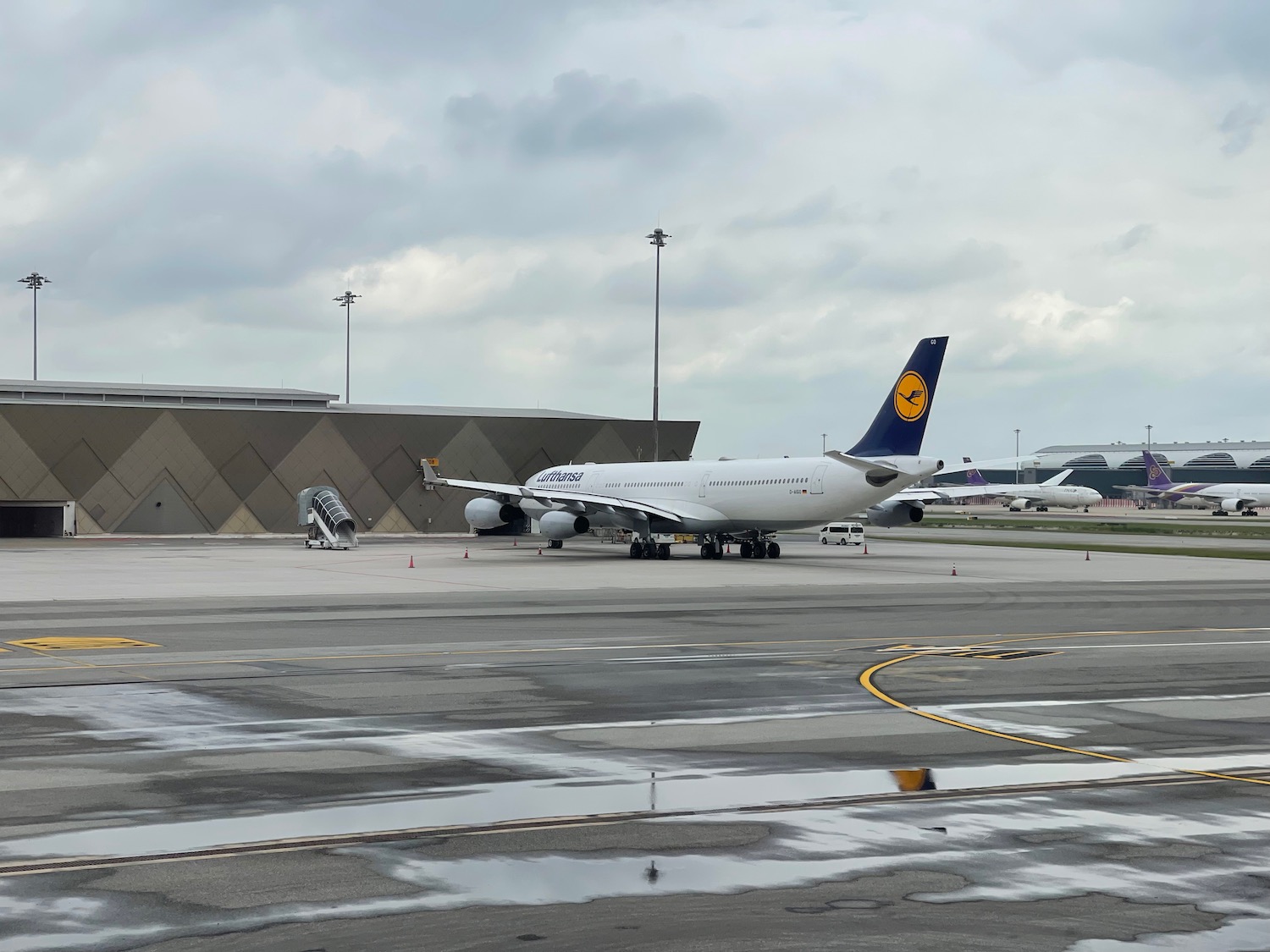 a large white airplane on a runway