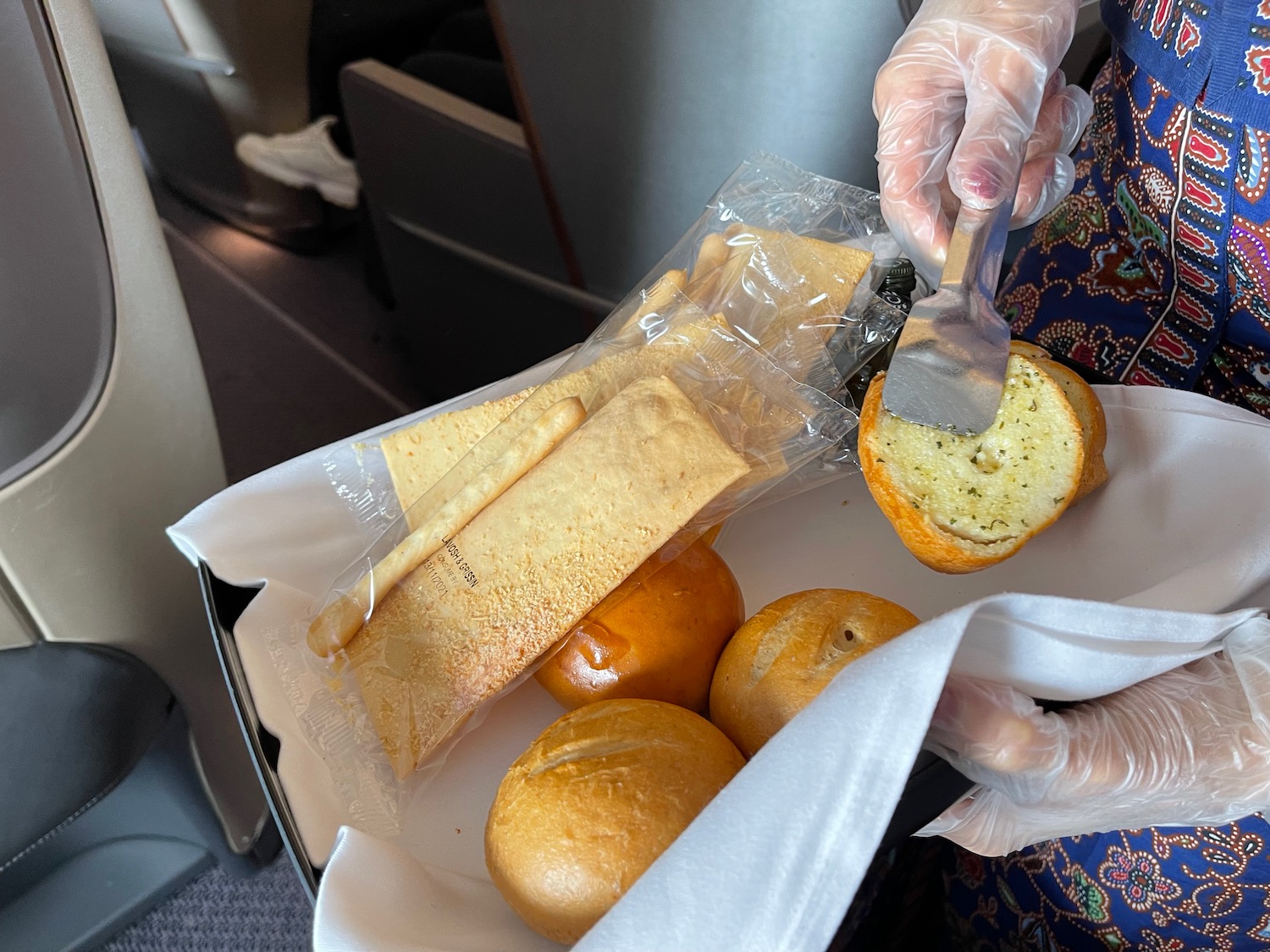 a person putting food on a tray