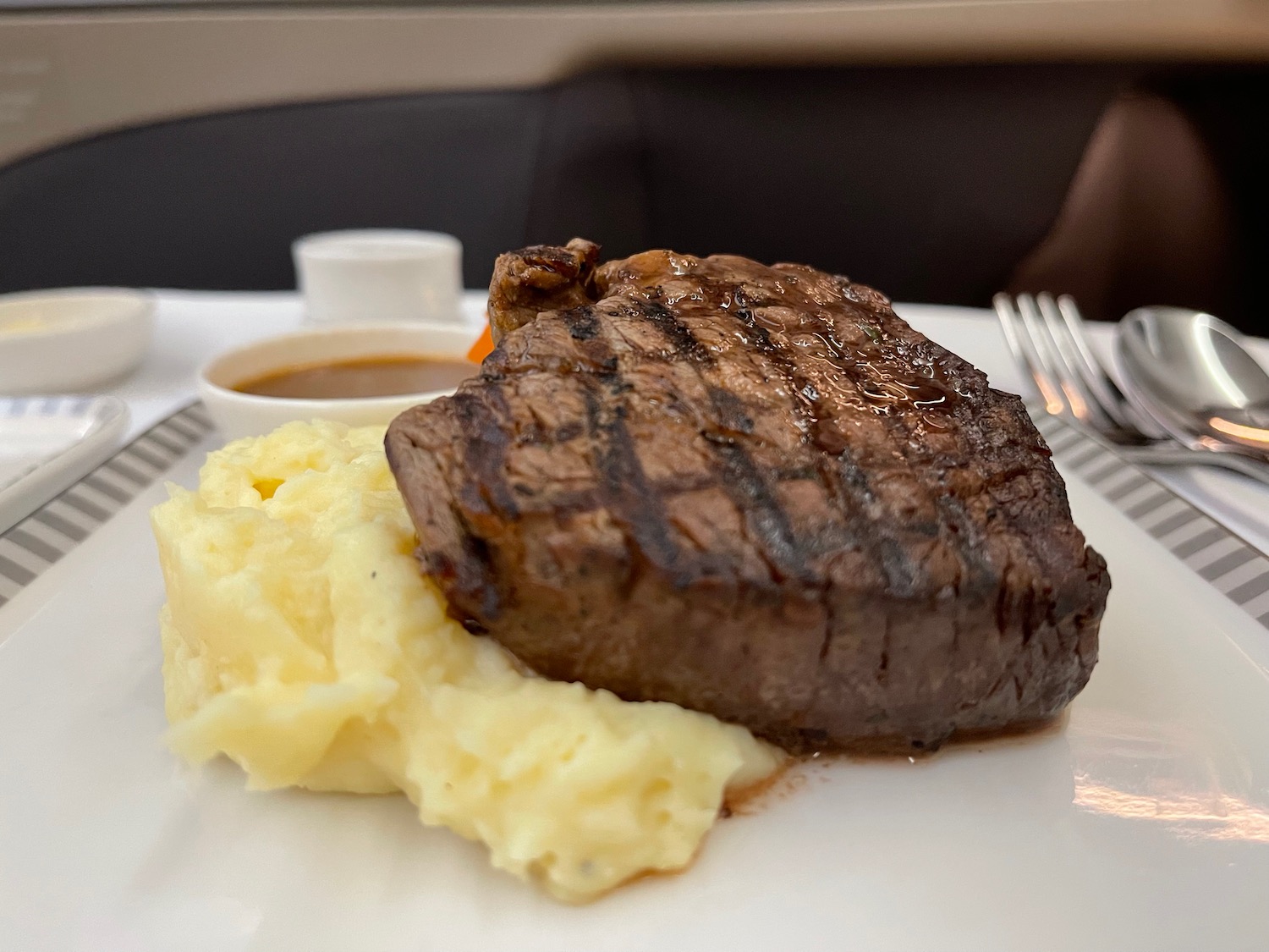 a plate of food with fork and knife