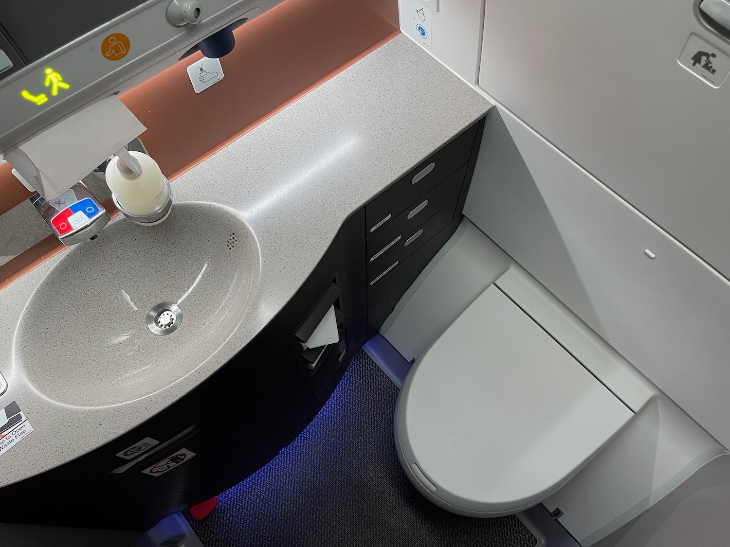 a bathroom with a sink and toilet