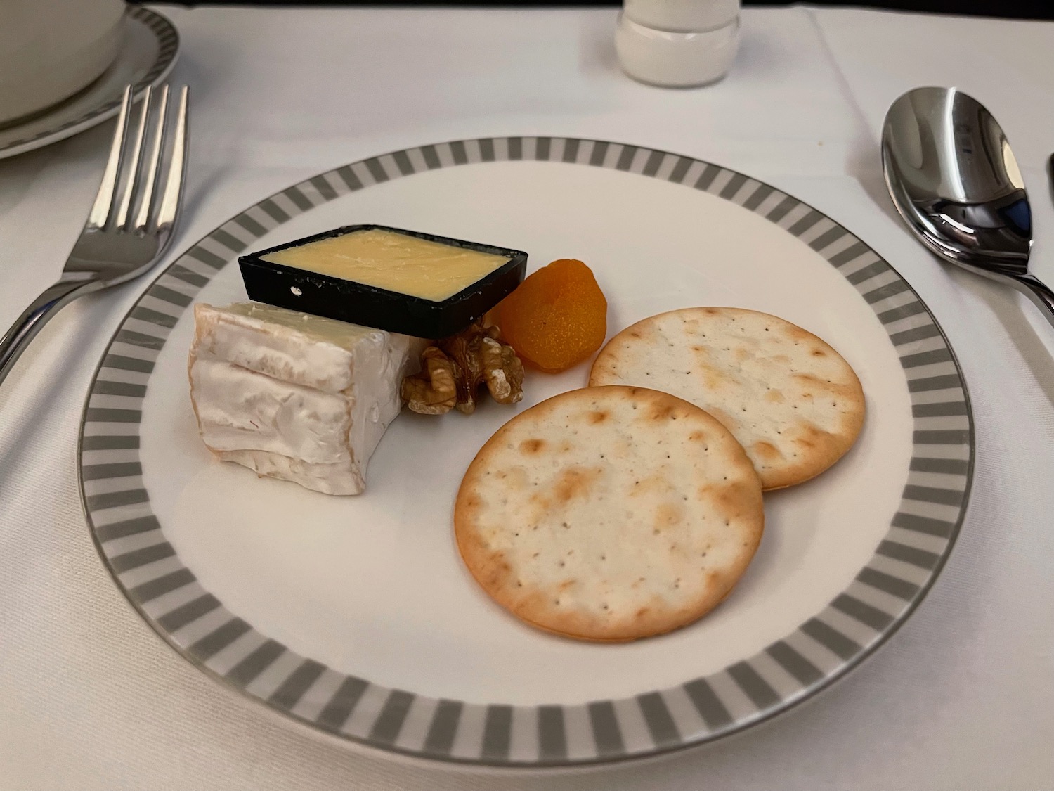 a plate of cheese and crackers