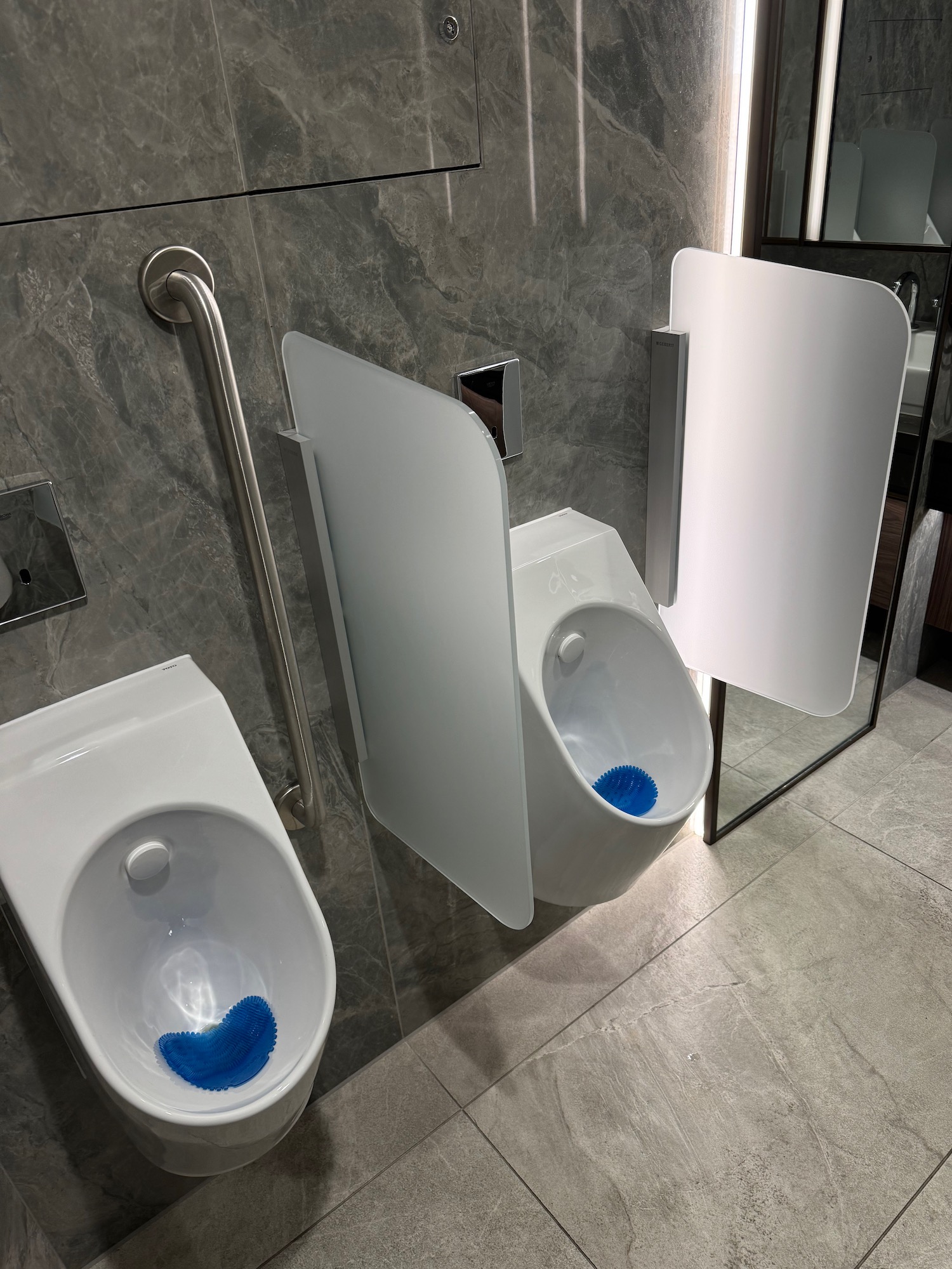 a urinals in a bathroom