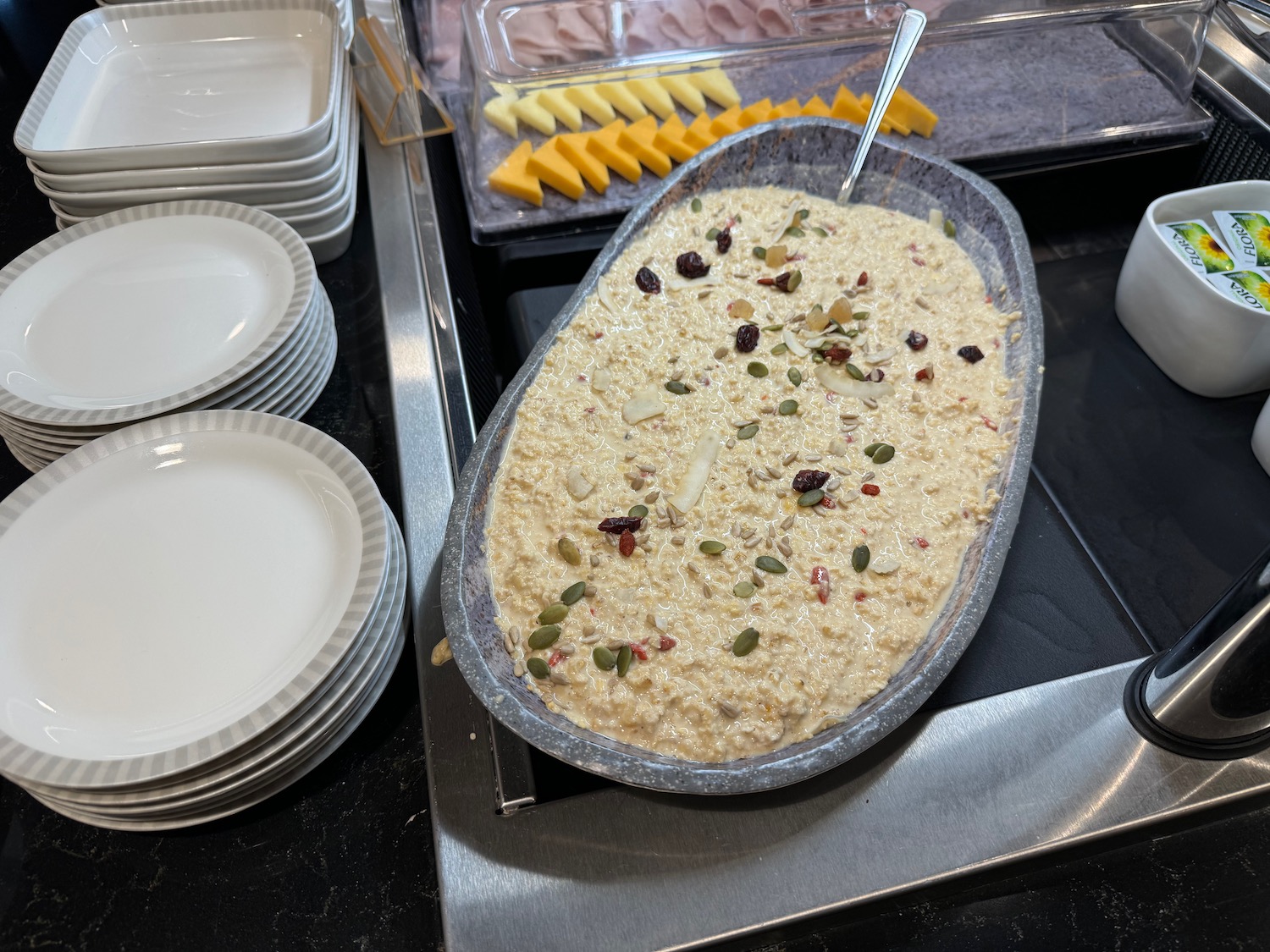 a bowl of food with a spoon in it