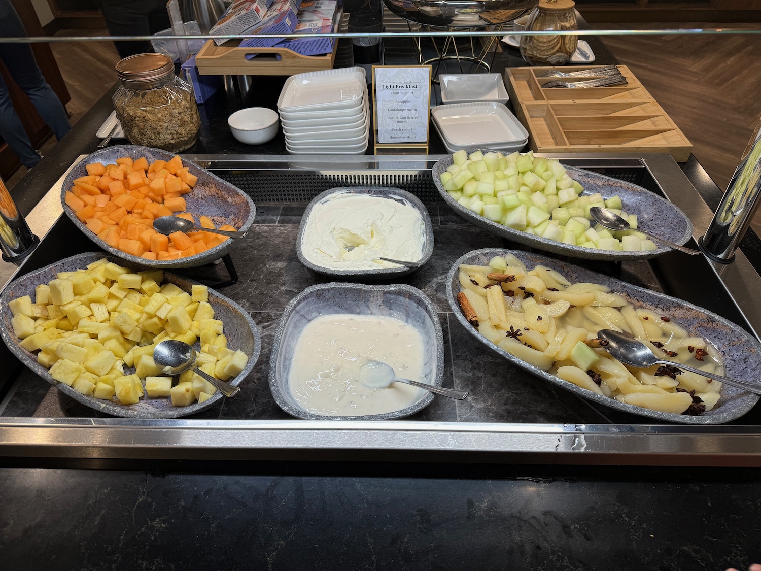 a tray of fruit and dips