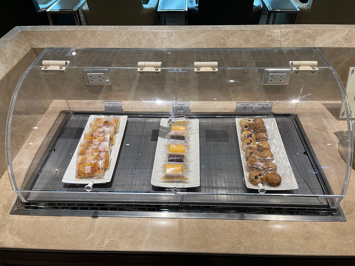 a trays of pastries on a counter