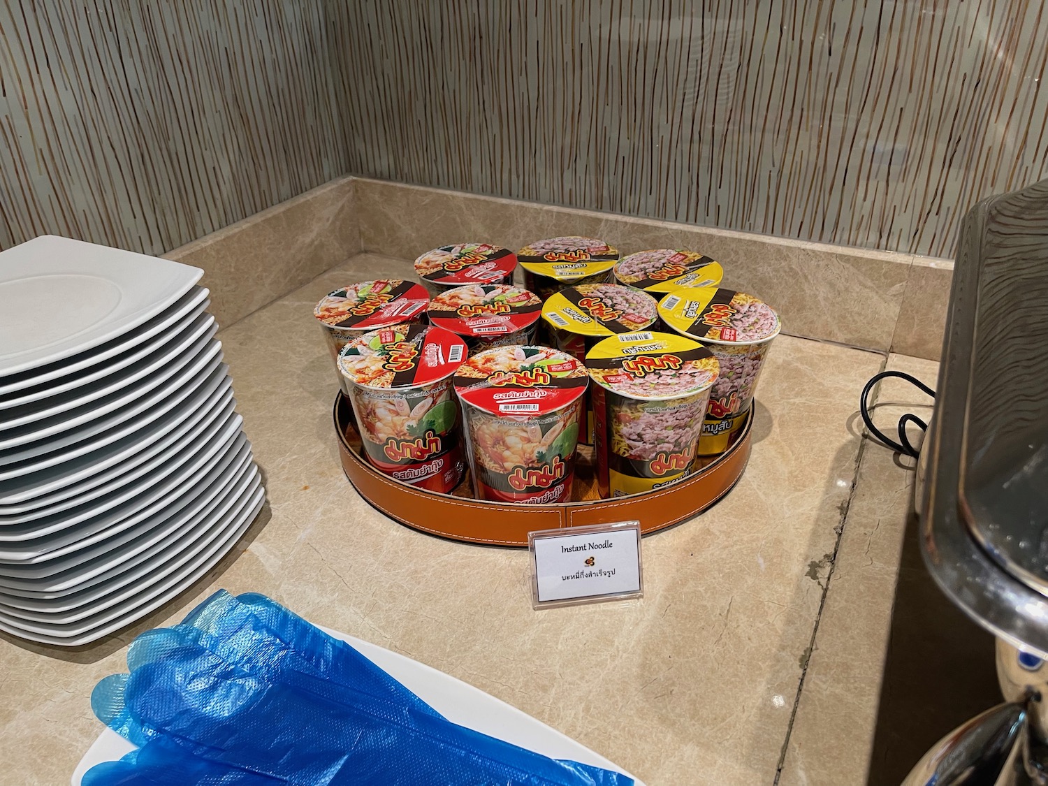 a group of containers of food on a tray