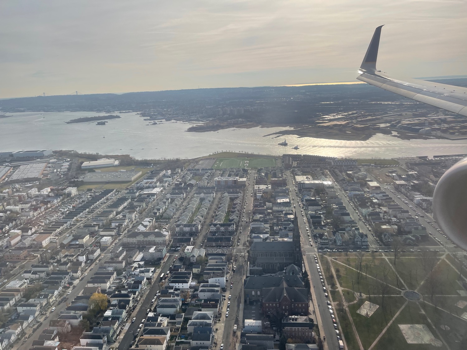 an aerial view of a city and water