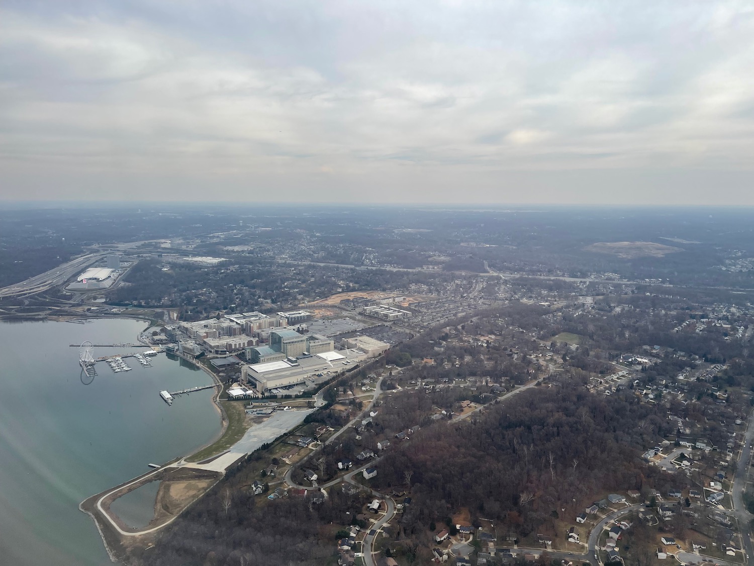 an aerial view of a city and water