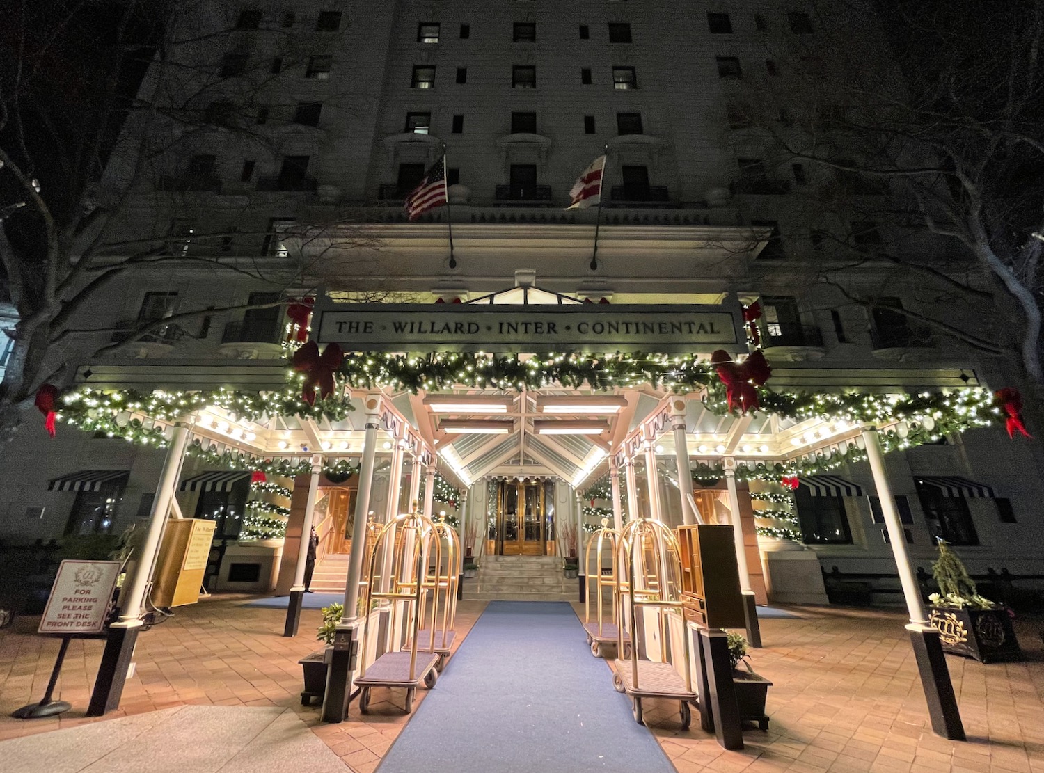 a building with lights and a blue carpet