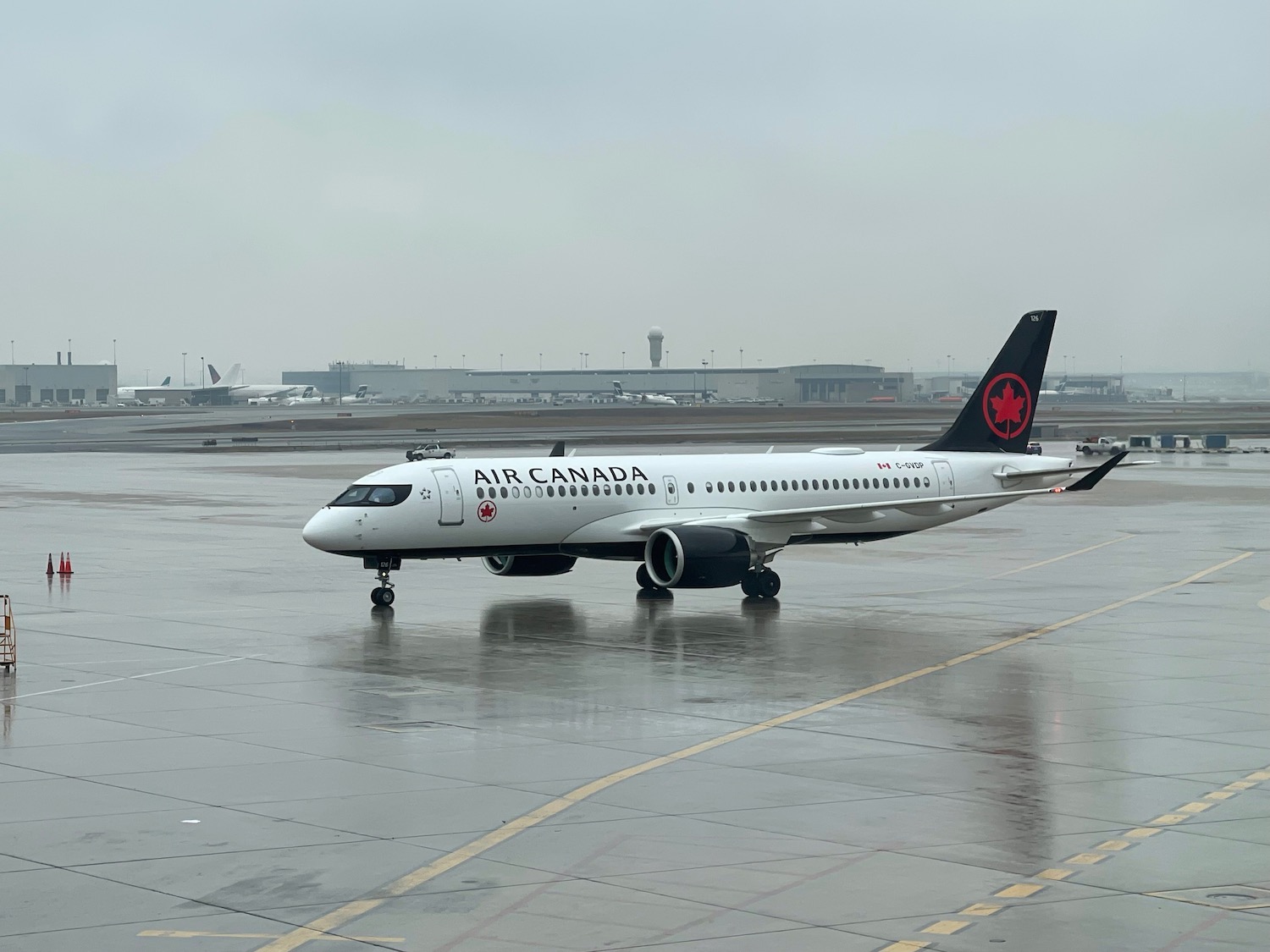 a plane on a wet runway