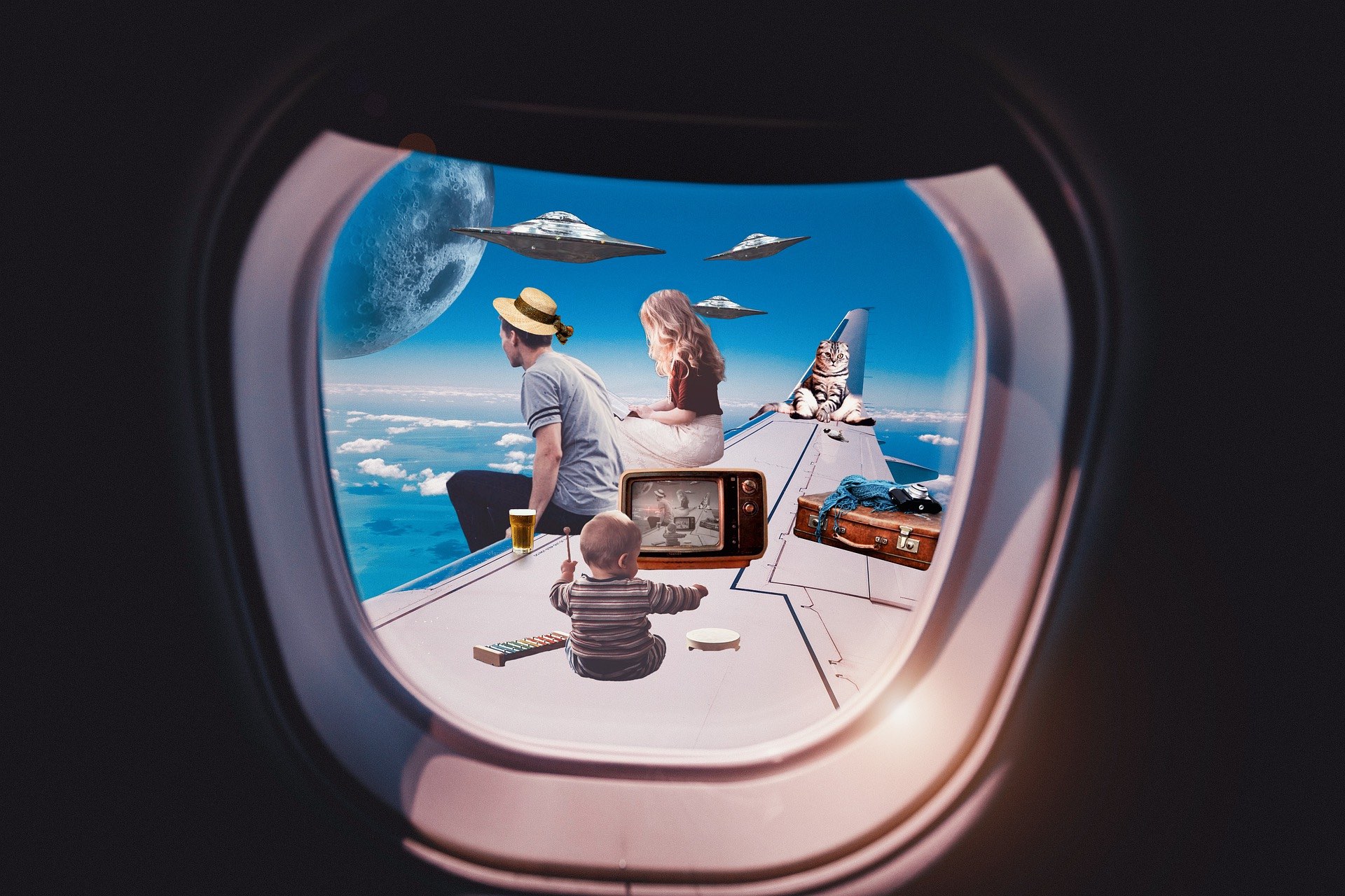 a group of people looking out a window of an airplane