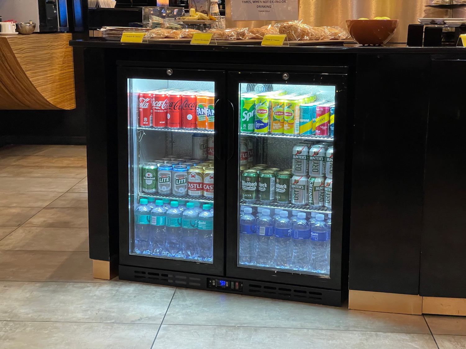 a beverage cooler with drinks in it