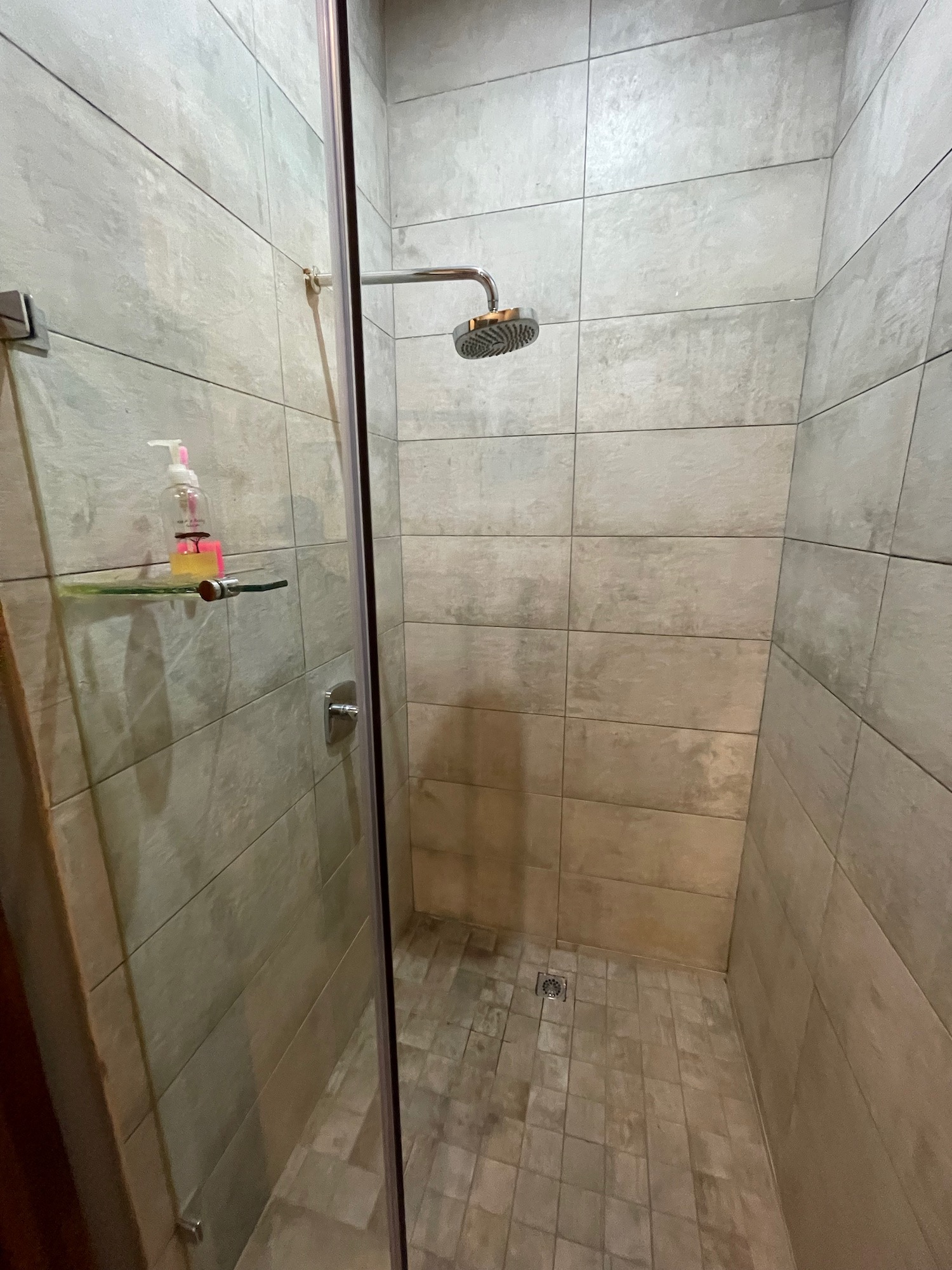 a shower with a shower head