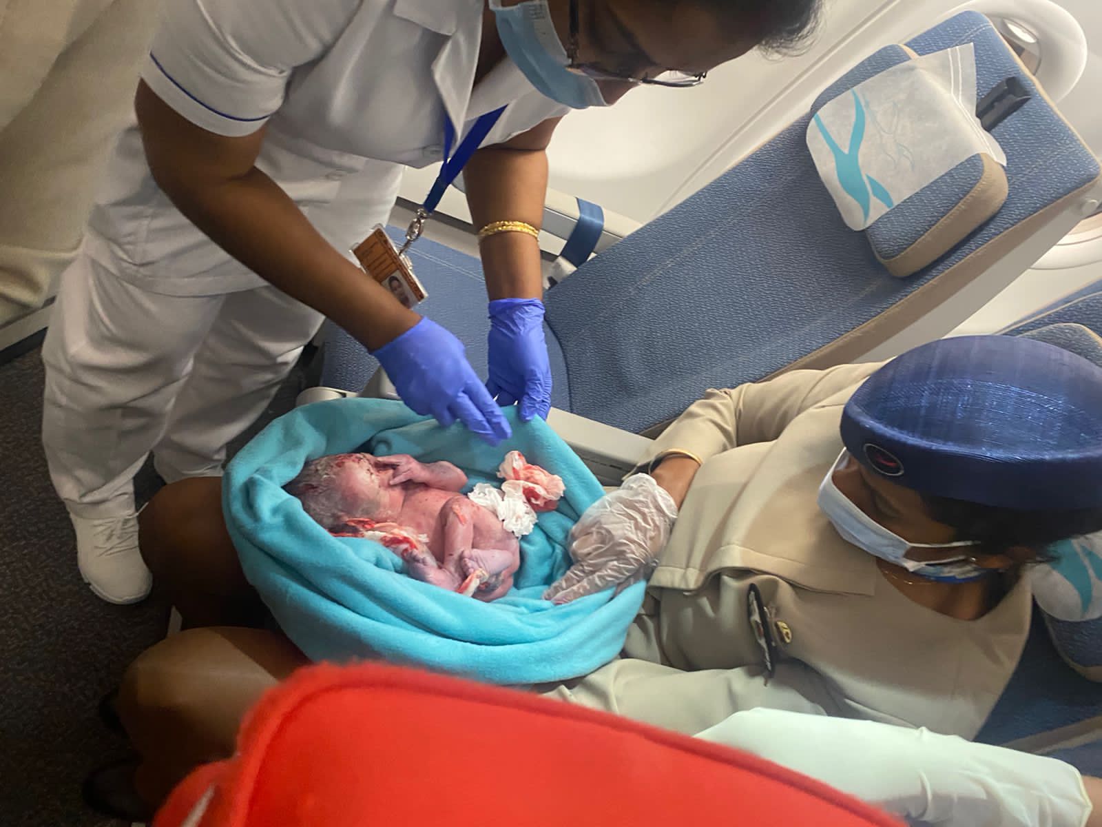 a person holding a baby