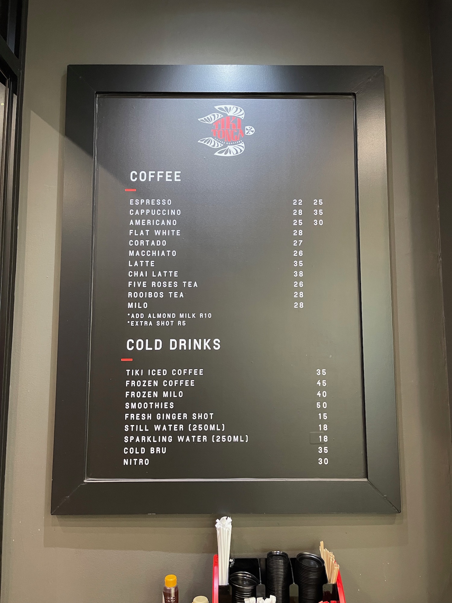 a menu board with white text on it