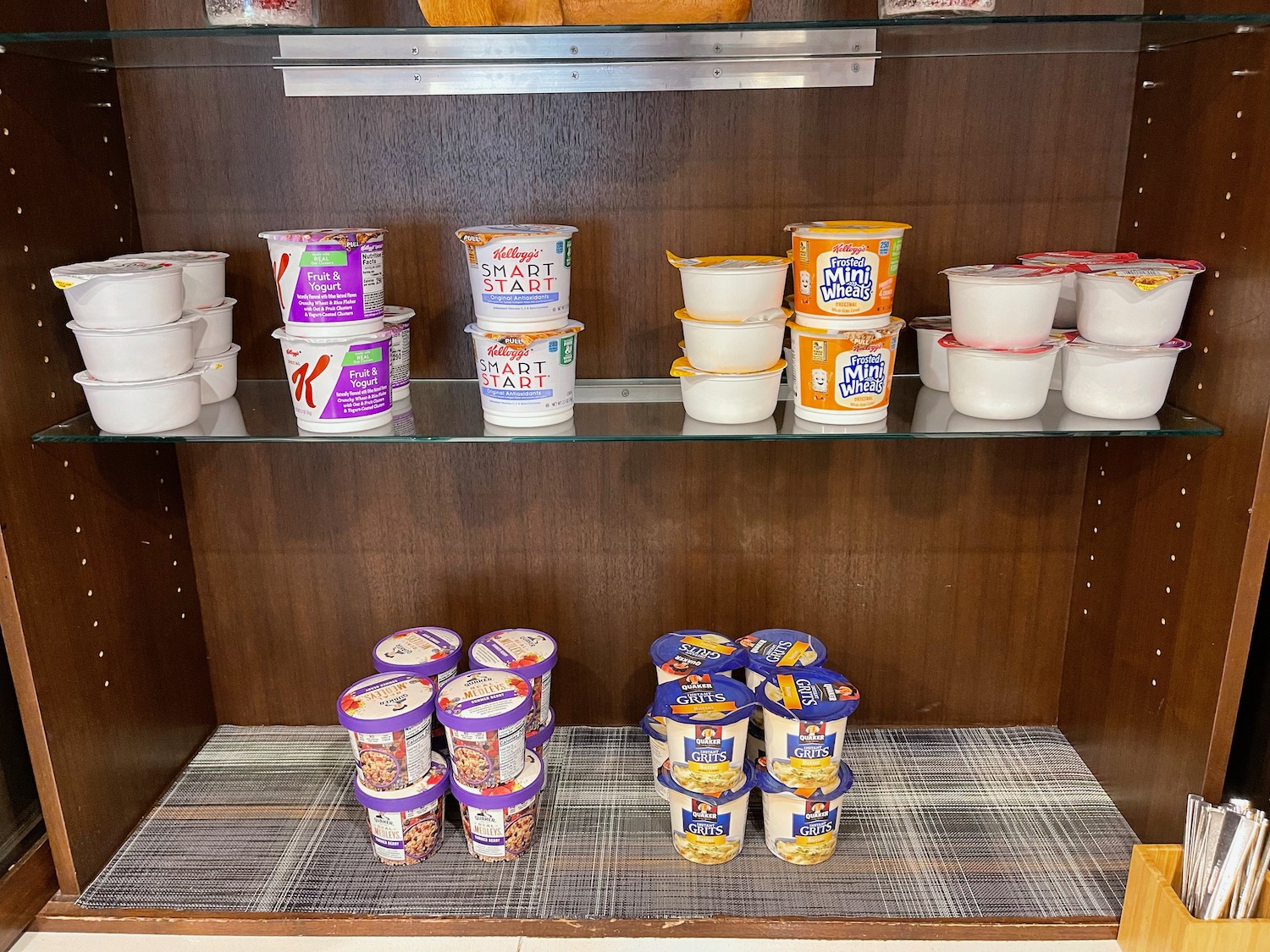 a shelf with containers of food on it