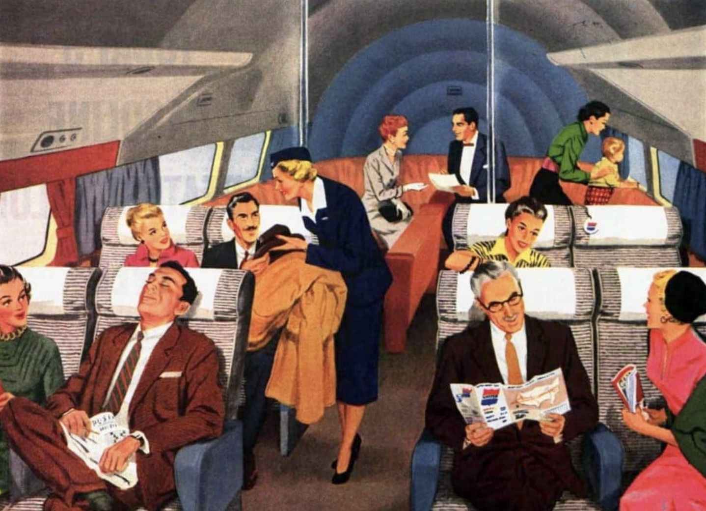 a group of people sitting in chairs on an airplane