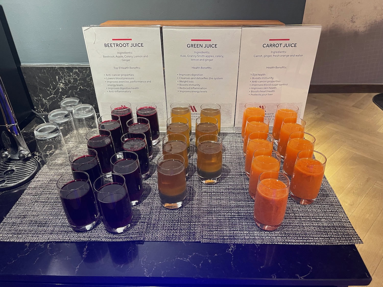 glasses of juice and juices on a table