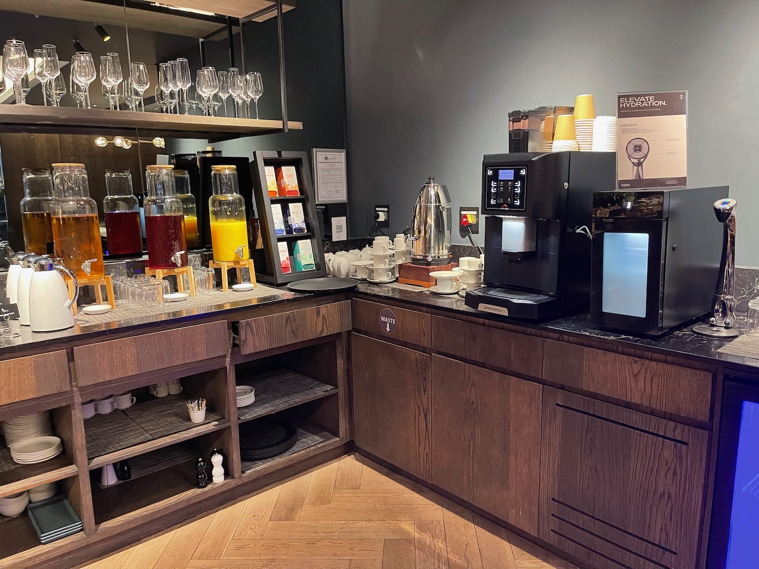 a coffee machine and coffee maker in a room