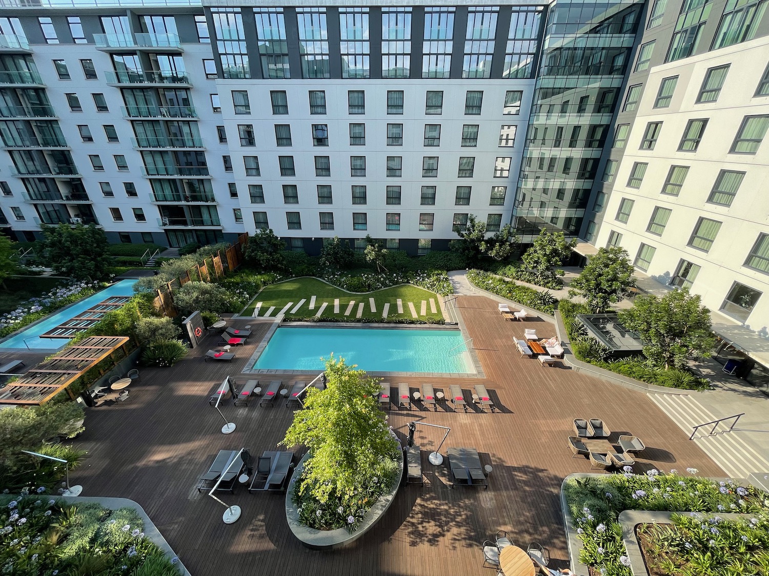 a pool and a building with a large building