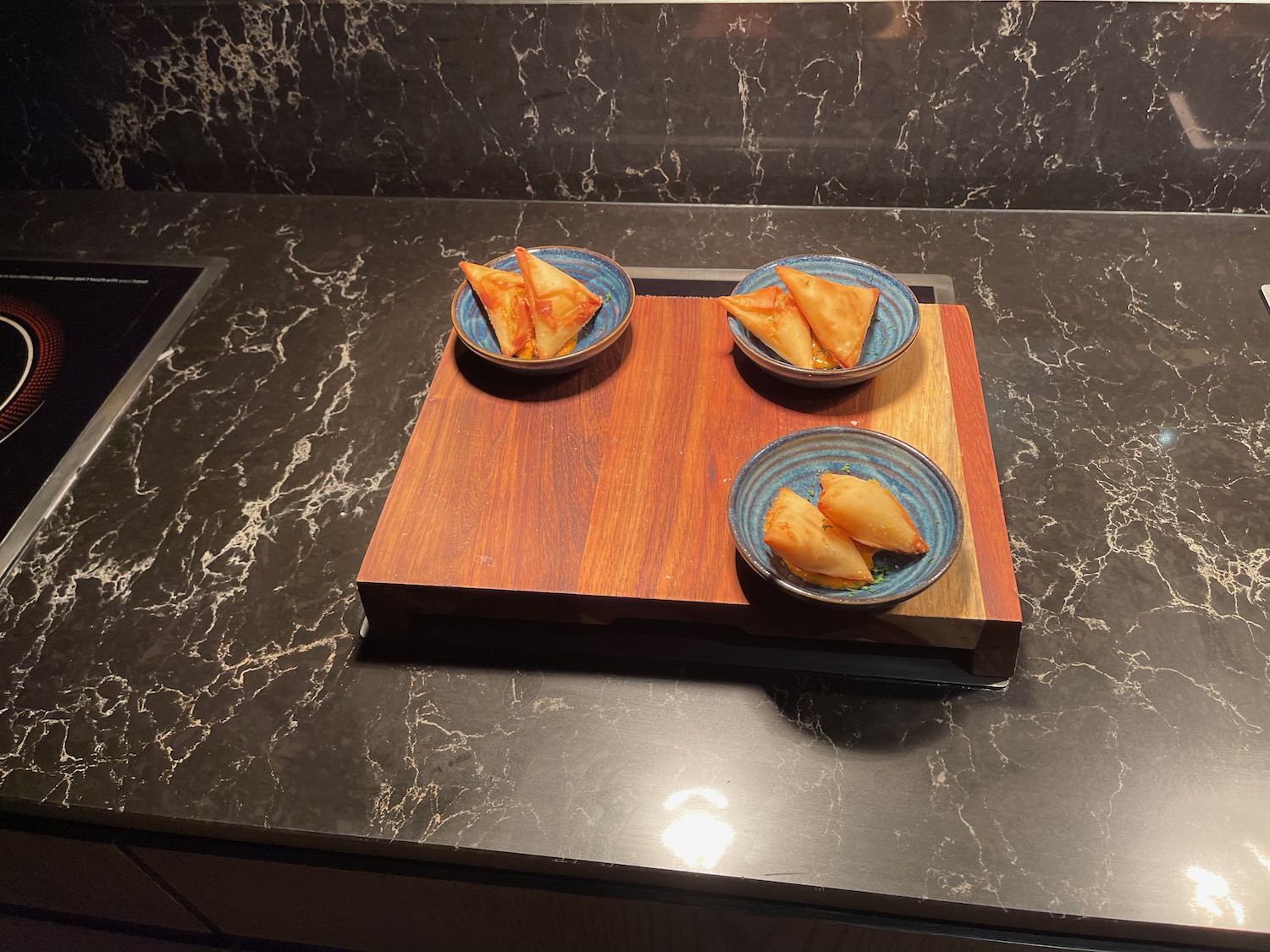 a plate of food on a cutting board