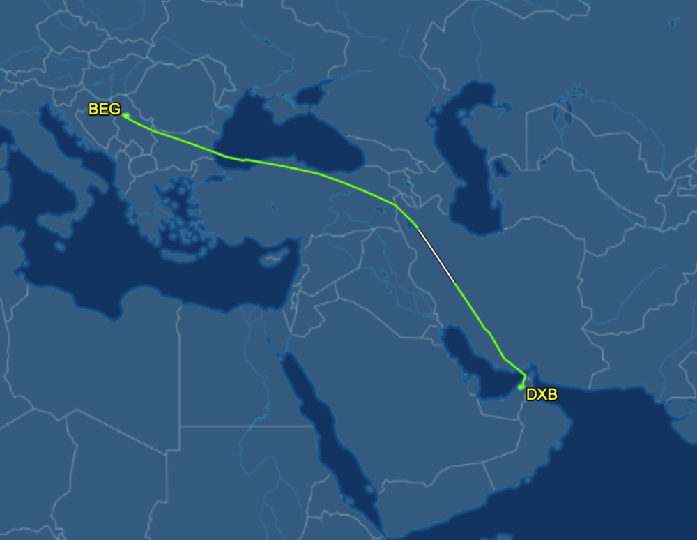 a map of the world with a green line