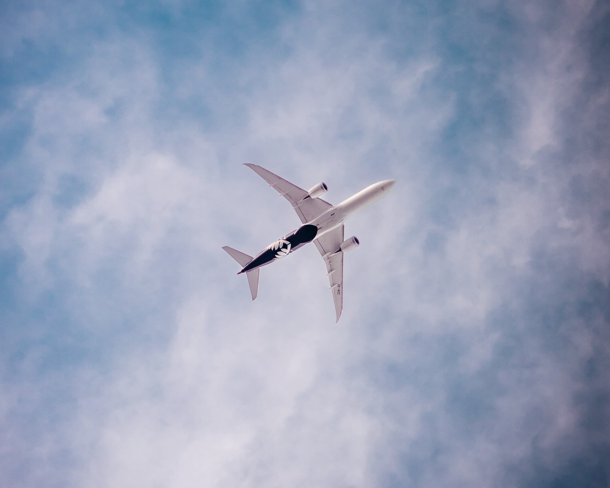 an airplane flying in the sky