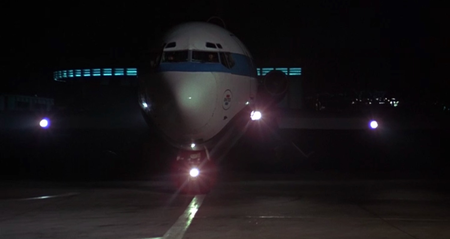 a plane with lights on