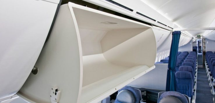 an open shelf on a plane