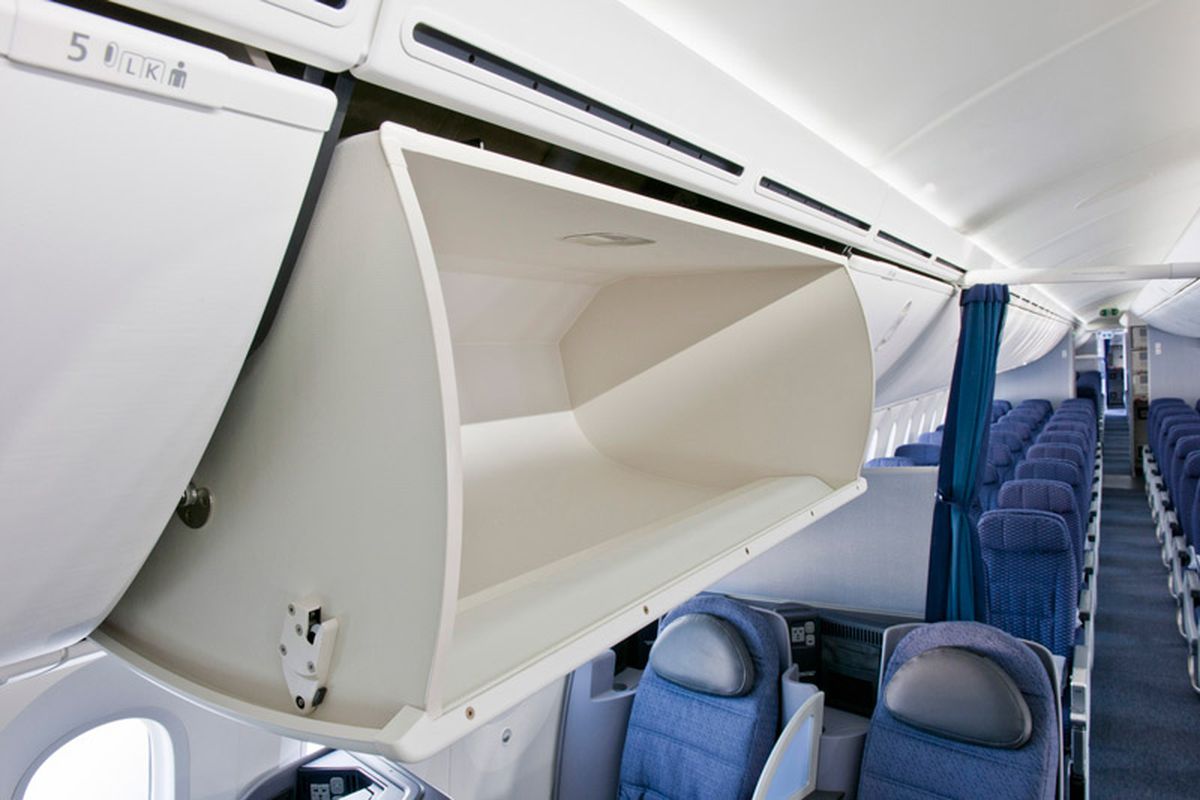 an open shelf on a plane
