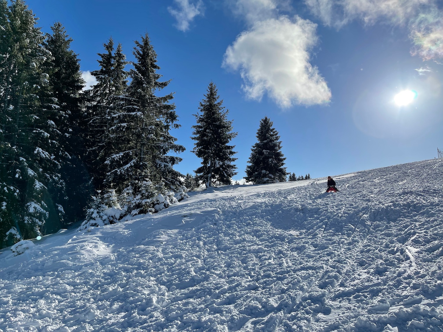 a person on a snow slide