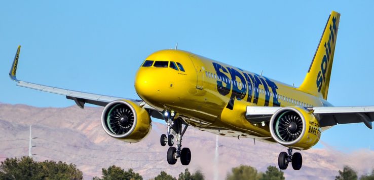 a yellow airplane taking off