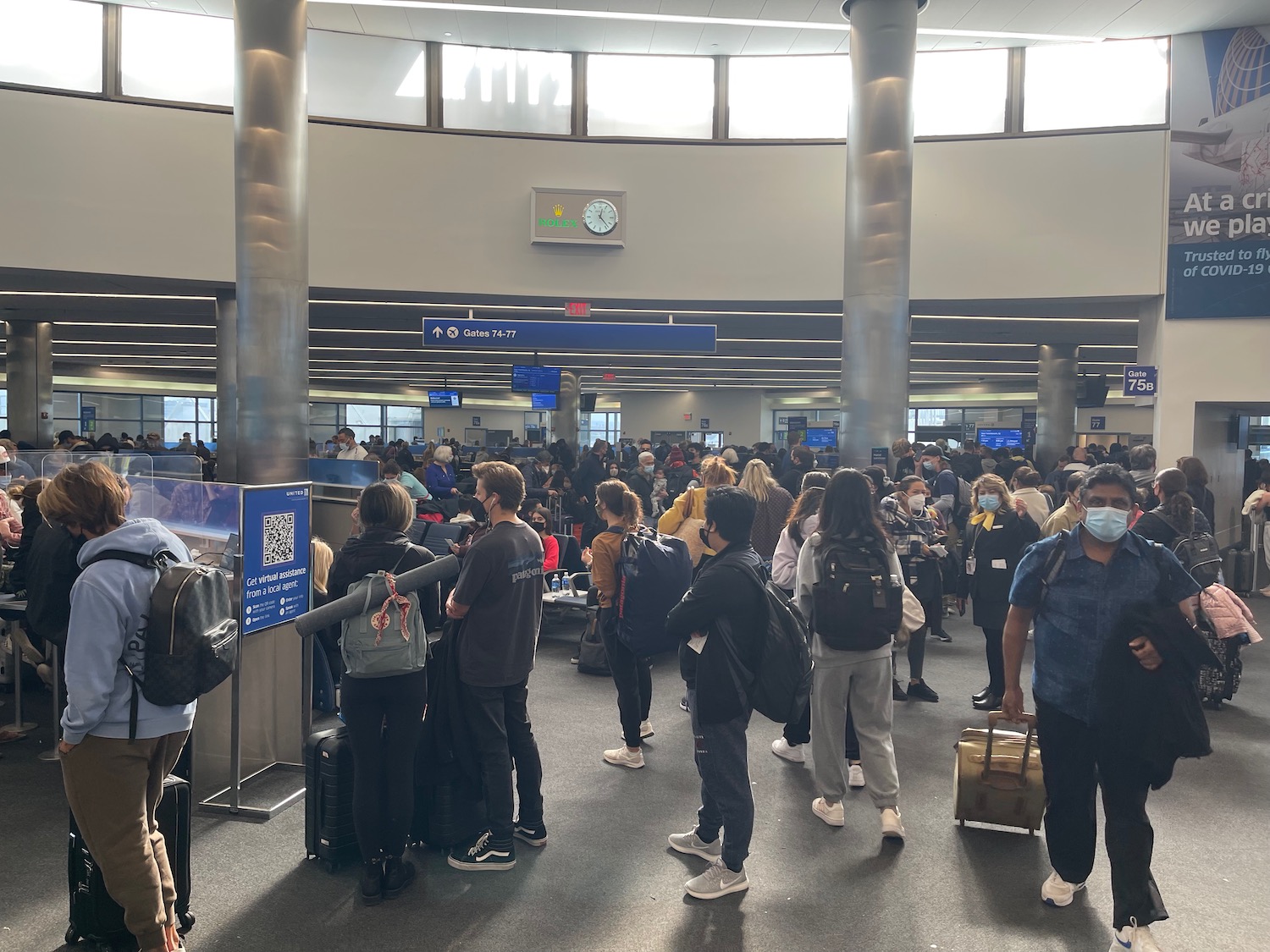 a group of people in a terminal