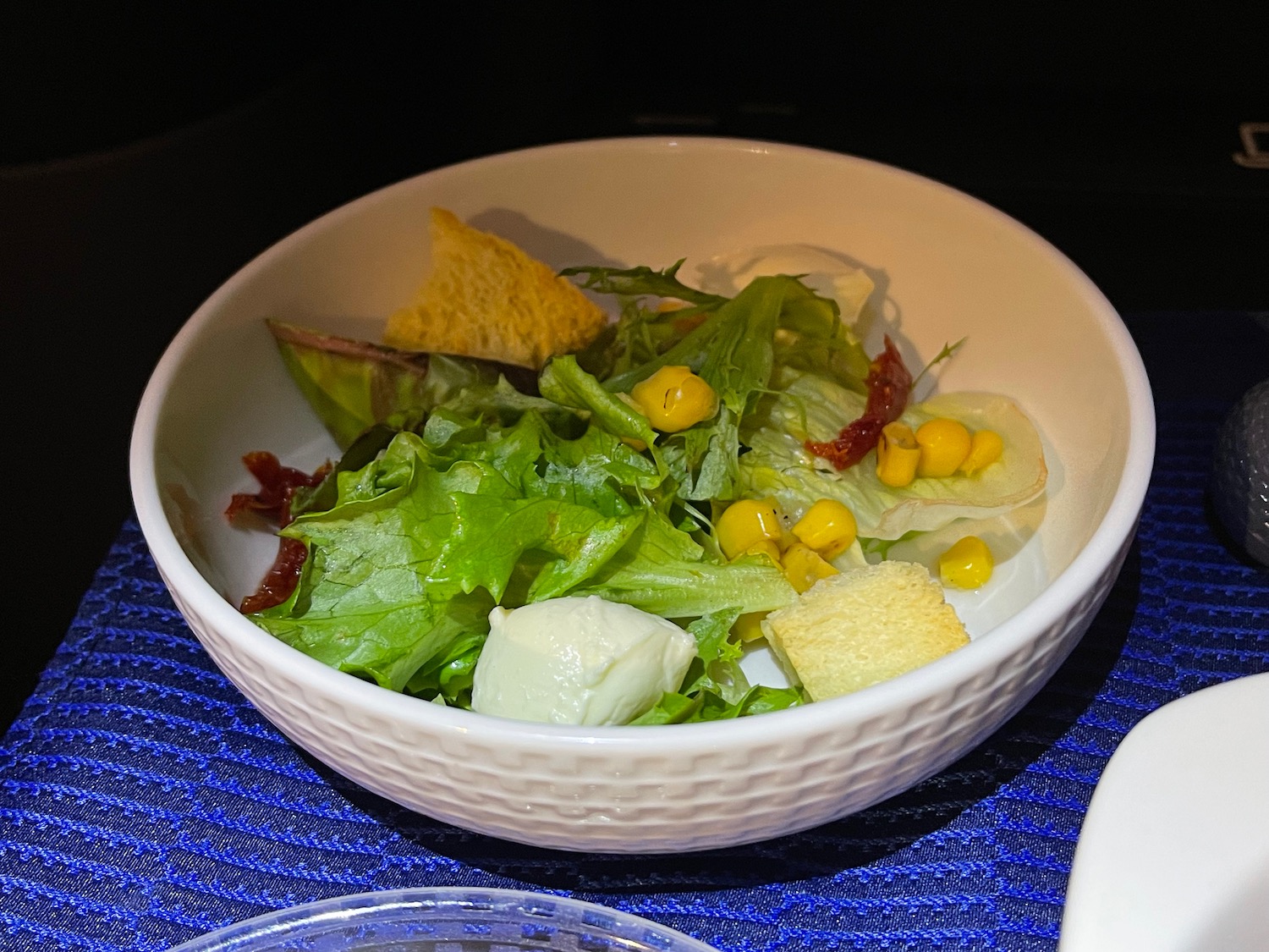 a bowl of salad on a table