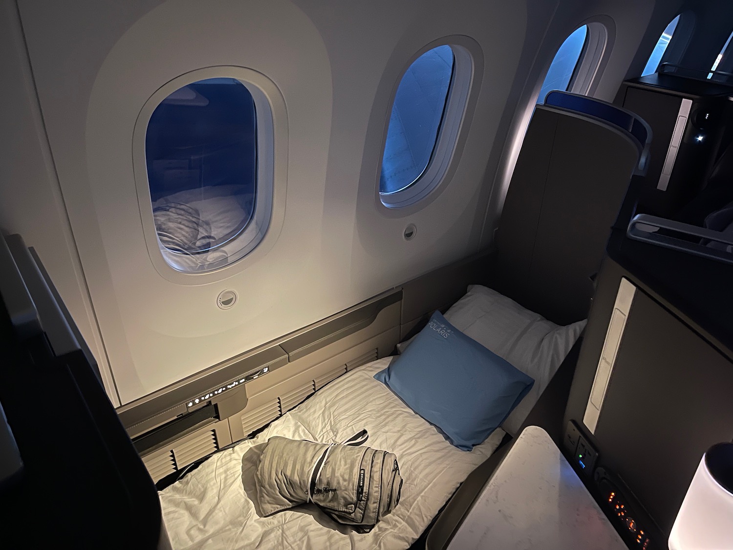 a bed in a plane