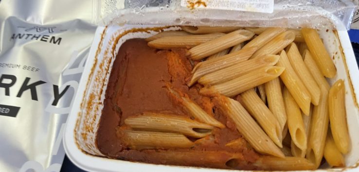 a container of pasta and sauce