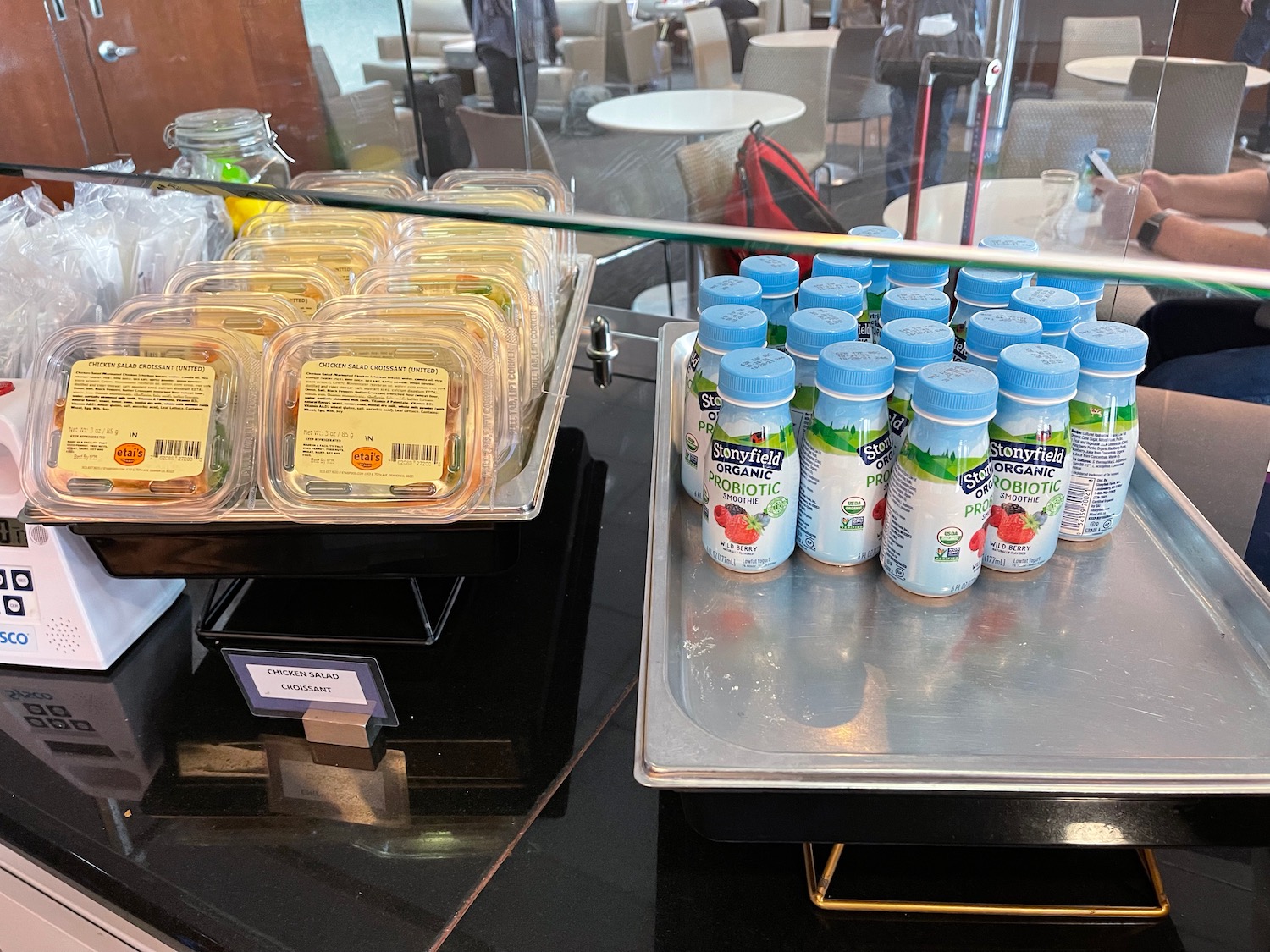 a group of plastic containers on a tray