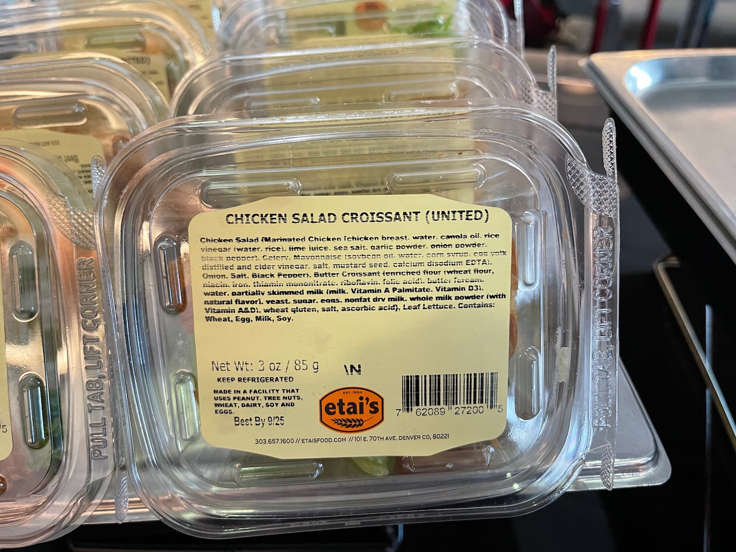 plastic containers of food on a shelf