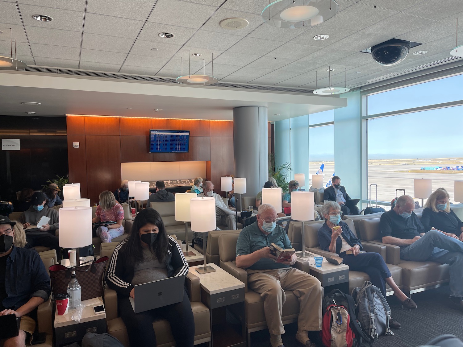 a group of people sitting in a lounge