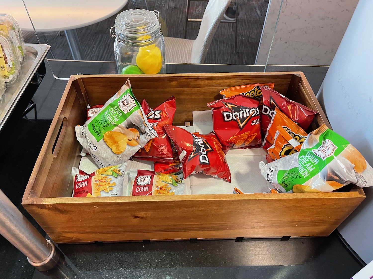 a wooden box with chips in it