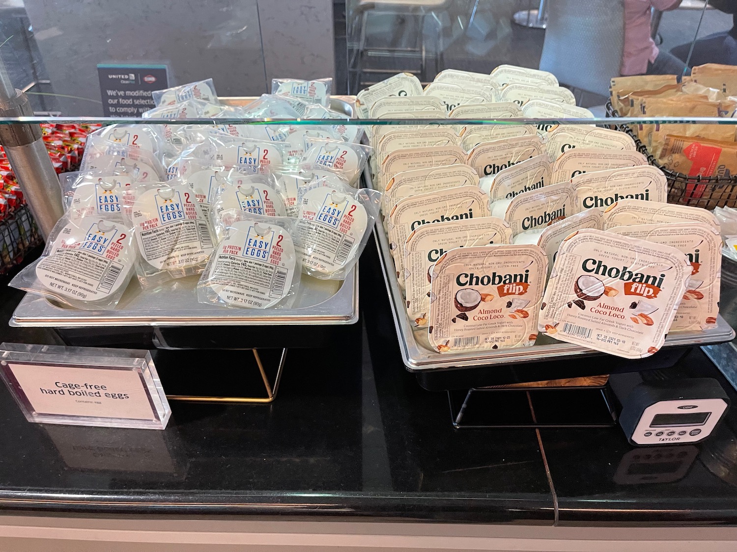 a trays of food on a counter