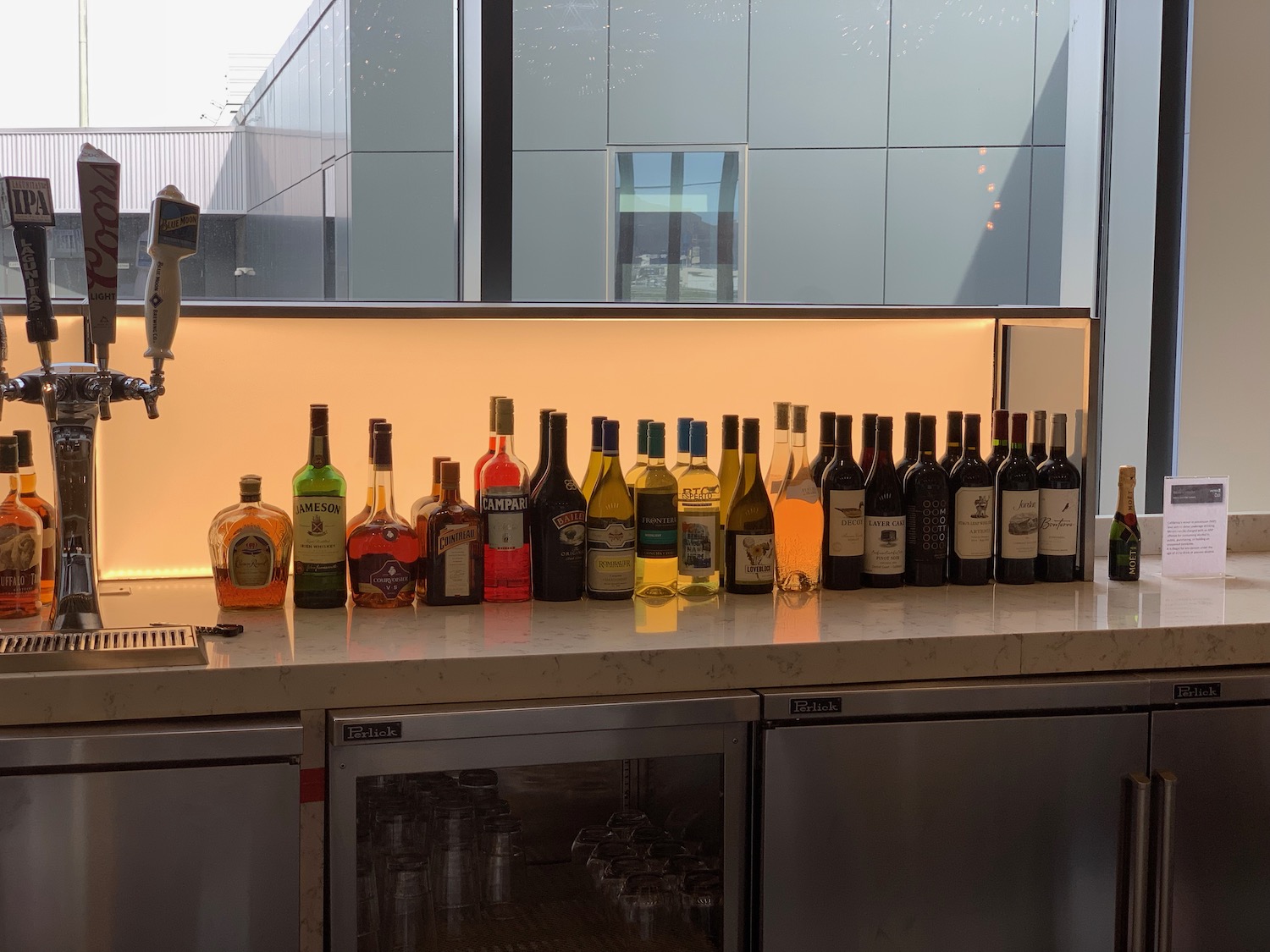 a group of bottles of alcohol on a counter