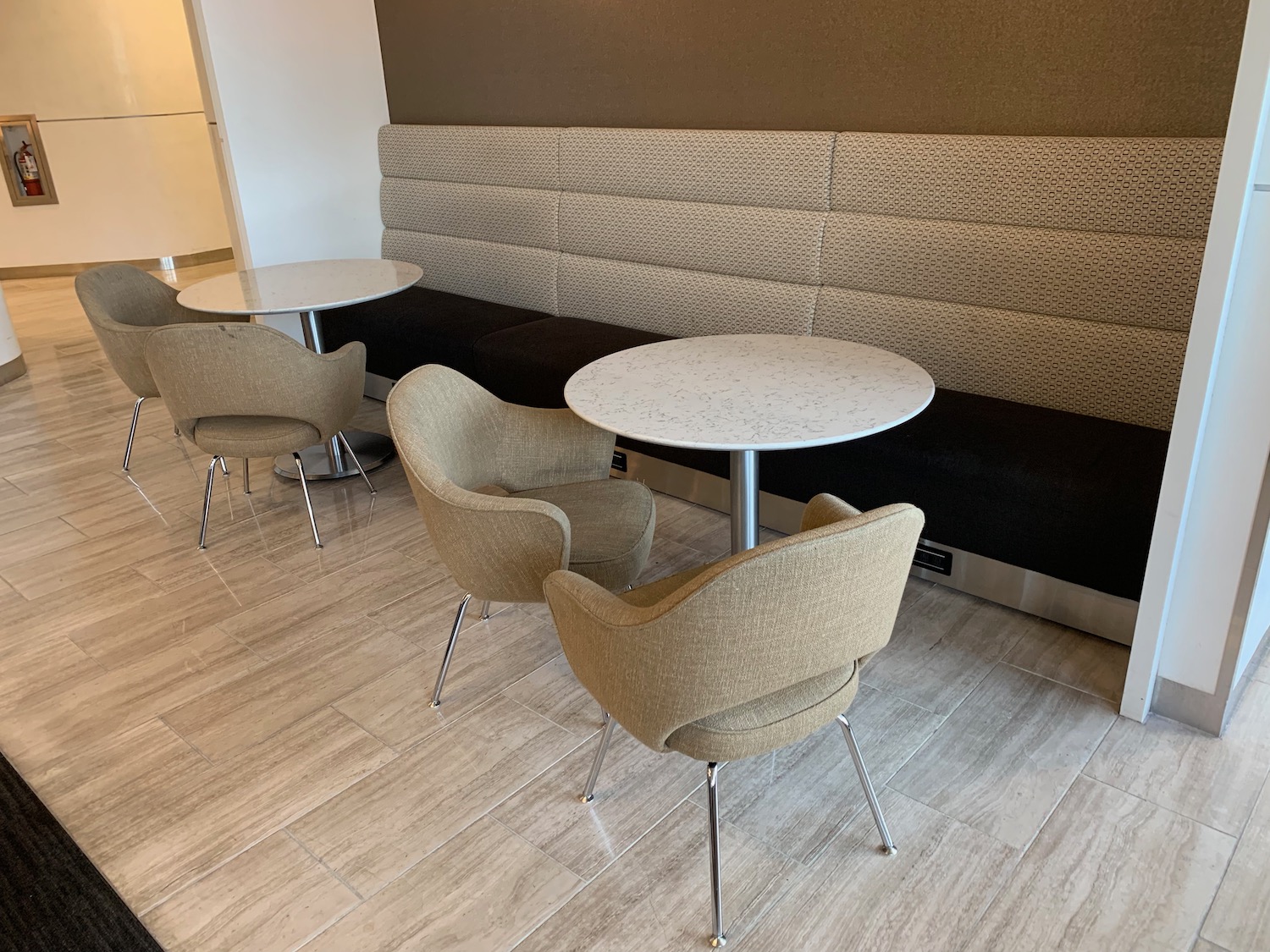 a group of tables and chairs in a room